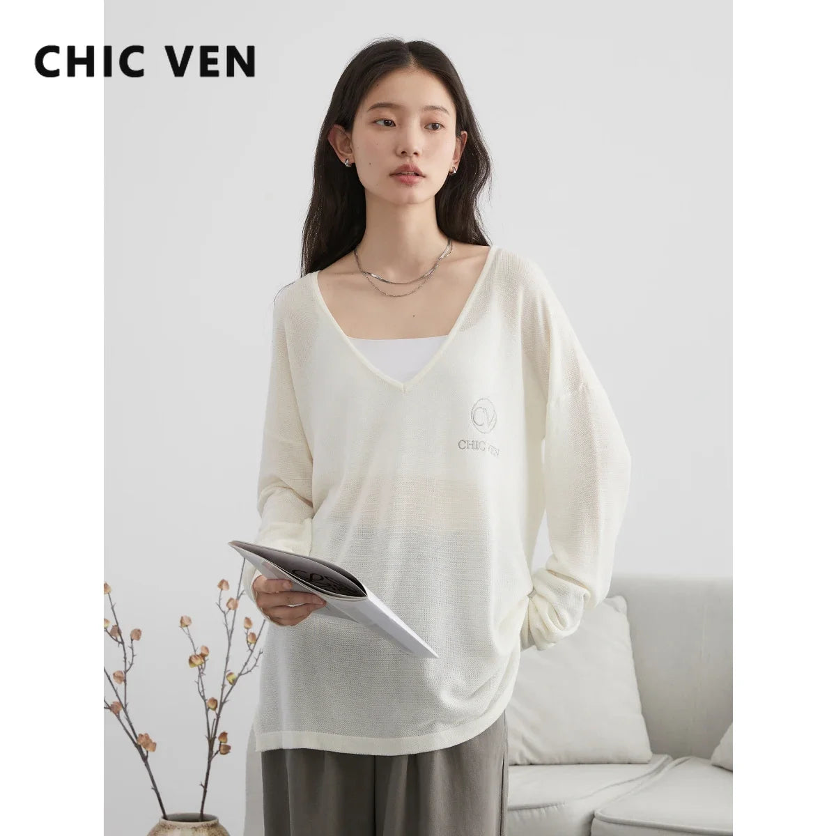 Chic and stylish Loose V-Neck Embroidered T-Shirt, perfect for Spring/Summer 2024. Made from lightweight, breathable fabric, this versatile tee features elegant embroidery and a flattering loose fit. Ideal for casual outings, it combines comfort