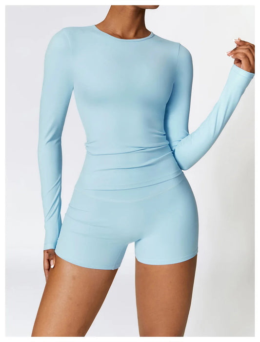 Elevate your activewear collection with the NCLAGEN Yoga Shirt! This stylish long-sleeve top features a quick-dry, breathable nylon and spandex blend for ultimate comfort during workouts. Designed with a flattering slim fit, it enhances your silhouette