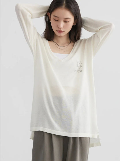 Elevate your wardrobe with our Loose V-Neck Embroidered T-Shirt, perfect for Spring/Summer 2024! This stylish tee combines lightweight, breathable fabric with elegant embroidered details, ensuring comfort and sophistication. The loose fit flatters every body