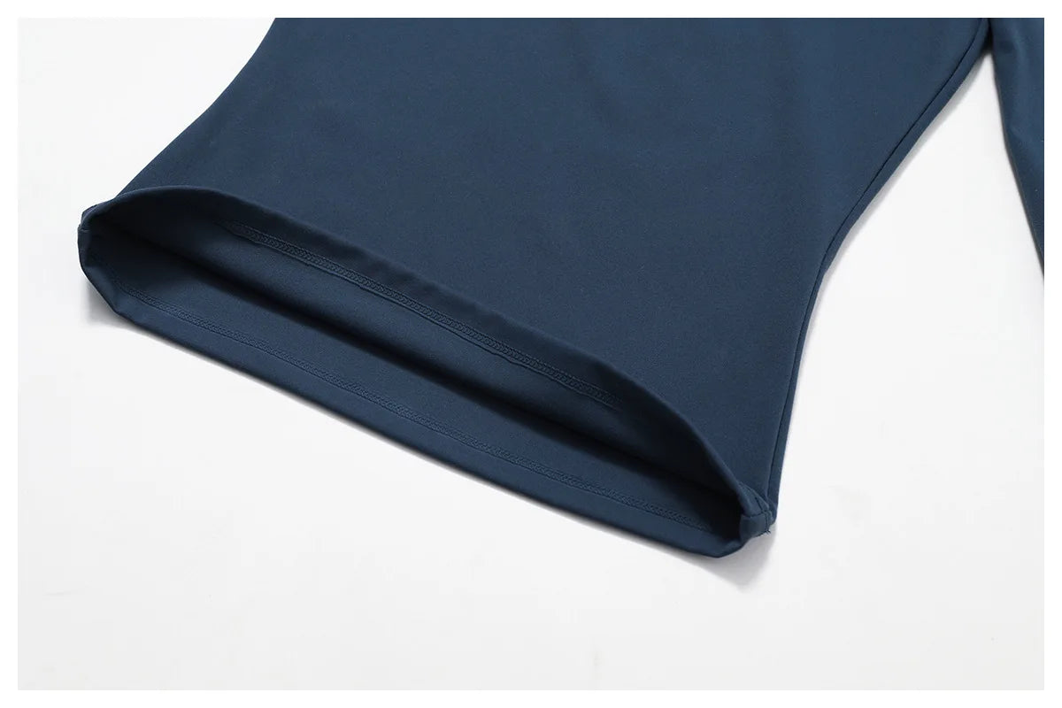 Elevate your activewear collection with the NCLAGEN Yoga Shirt! This stylish long-sleeve top features a quick-dry, breathable nylon and spandex blend, ensuring optimal comfort during workouts. The flattering slim fit enhances your silhouette, while full