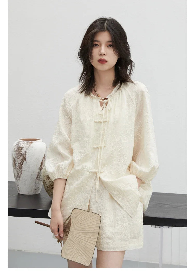 Discover the elegance of our **Embroidered Chinese Blouse & Shorts Set**, designed for the modern fashionista. This exquisite outfit features intricate Chinese embroidery and is crafted from soft, breathable fabric for ultimate comfort. The relaxed fit flatters all body types