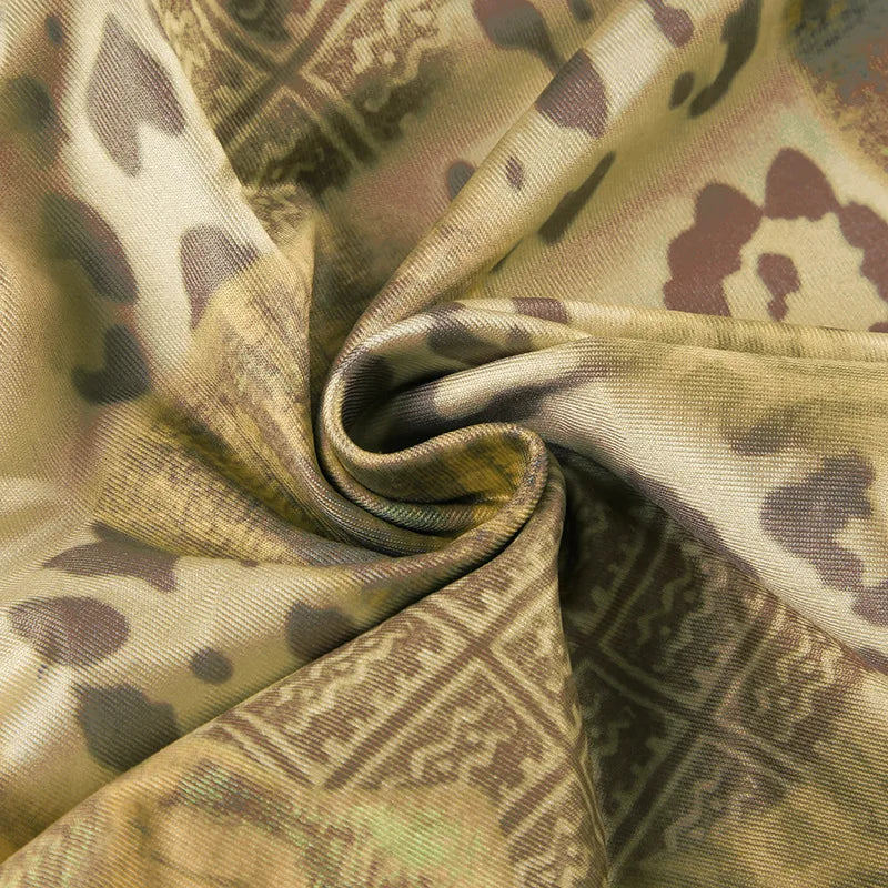 Discover the Gaono Y2K Vintage Women's Sleeveless Cami Top, crafted from lightweight broadcloth fabric with a unique abstract print. This stylish camisole features a charming ribbon tie-up front and slight stretch for a comfortable fit. Perfect for layering or