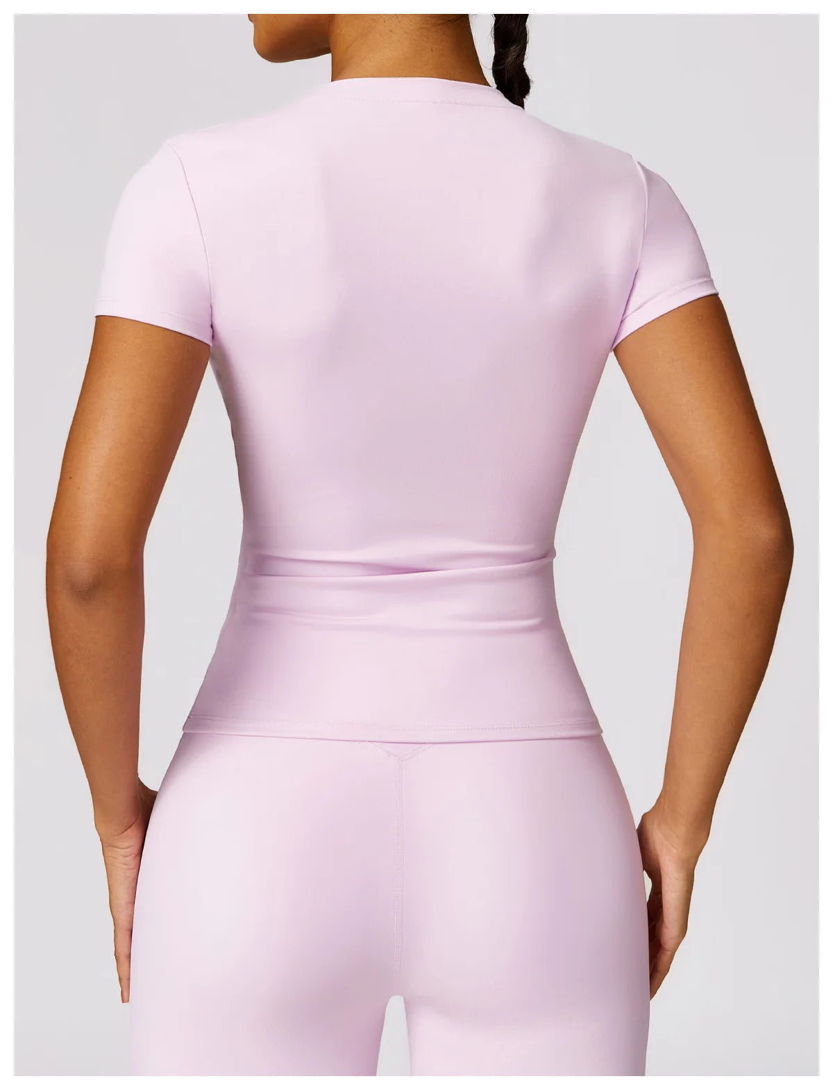 Elevate your fitness wardrobe with the NCLAGEN Short Sleeve T-Shirt, crafted from lightweight, breathable nylon for ultimate comfort. This stylish top features a flattering fitted silhouette and round neck design, perfect for workouts, yoga sessions, or casual outings. Available