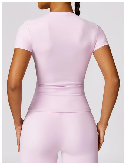 Elevate your fitness wardrobe with the NCLAGEN Short Sleeve T-Shirt, crafted from lightweight, breathable nylon for ultimate comfort. This stylish top features a flattering fitted silhouette and round neck design, perfect for workouts, yoga sessions, or casual outings. Available