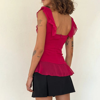Elevate your summer style with the Gaono Y2K Fairy Crop Top! This charming ruffle-trim tank features a square neckline and lightweight chiffon, perfect for warm days and nights. Crafted from a soft cotton and polyester blend, it offers comfort