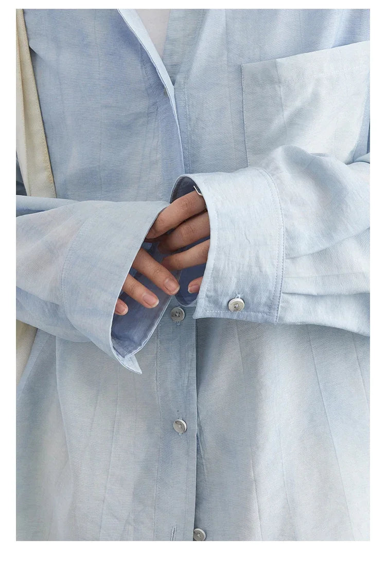 Elevate your summer wardrobe with the Textured Long Sleeve Blouse with Split Collar. This stylish blouse features a vibrant tie-dye pattern and is crafted from soft, breathable fabric for all-day comfort. The modern split collar design adds a chic twist,