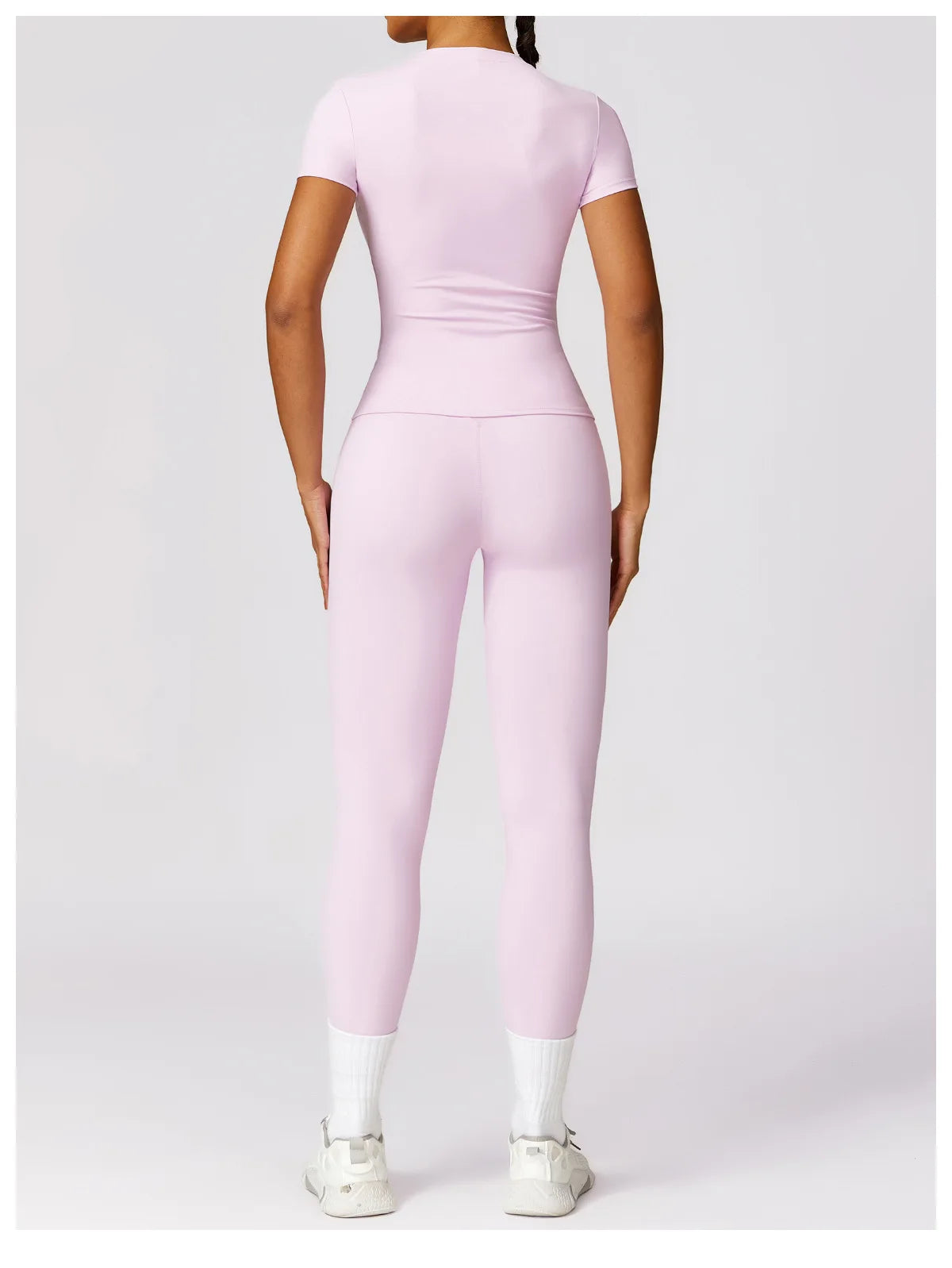 Elevate your activewear collection with the NCLAGEN Short Sleeve T-Shirt! This stylish and breathable top is designed for ultimate comfort during workouts, yoga sessions, or casual outings. Featuring a fitted silhouette and round neck, it ensures a flattering fit while