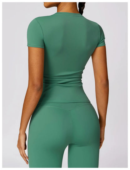 Elevate your fitness wardrobe with the NCLAGEN Short Sleeve T-Shirt, designed for both performance and style. This lightweight, breathable top offers ultimate comfort during workouts, yoga sessions, or casual outings. Featuring a flattering fitted silhouette and round neck, it