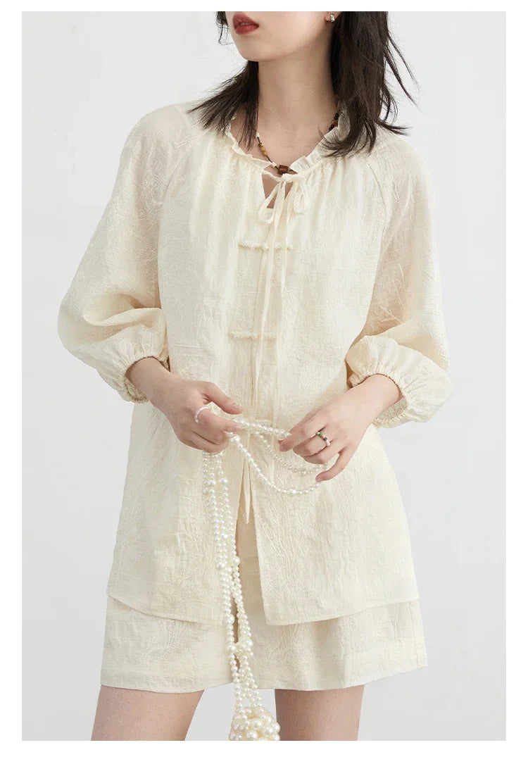 Discover the elegance of our **Embroidered Chinese Blouse & Shorts Set**, featuring intricate embroidery that beautifully blends traditional artistry with modern style. Crafted from soft, breathable fabric, this outfit ensures ultimate comfort for warm days while offering a relaxed fit that flat