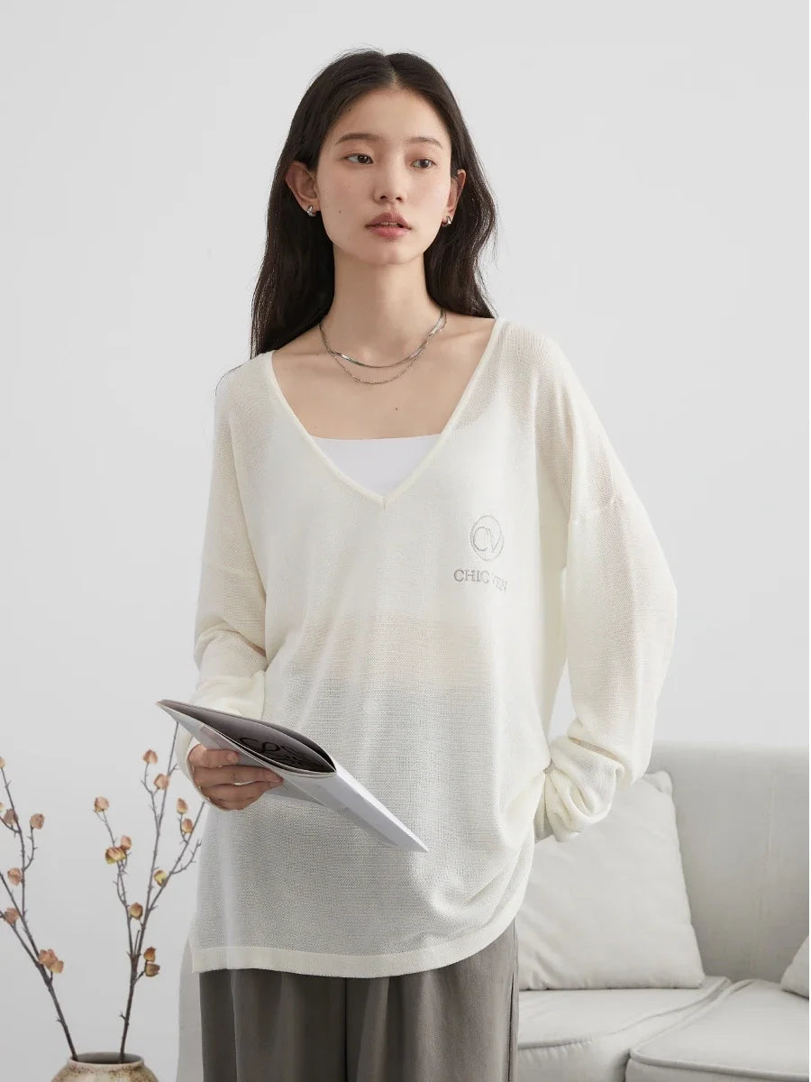 Elevate your wardrobe with our **Loose V-Neck Embroidered T-Shirt**, designed for ultimate comfort and style. This lightweight, breathable tee features stunning embroidery that adds a touch of elegance to your everyday look. The loose fit silhouette flatters every