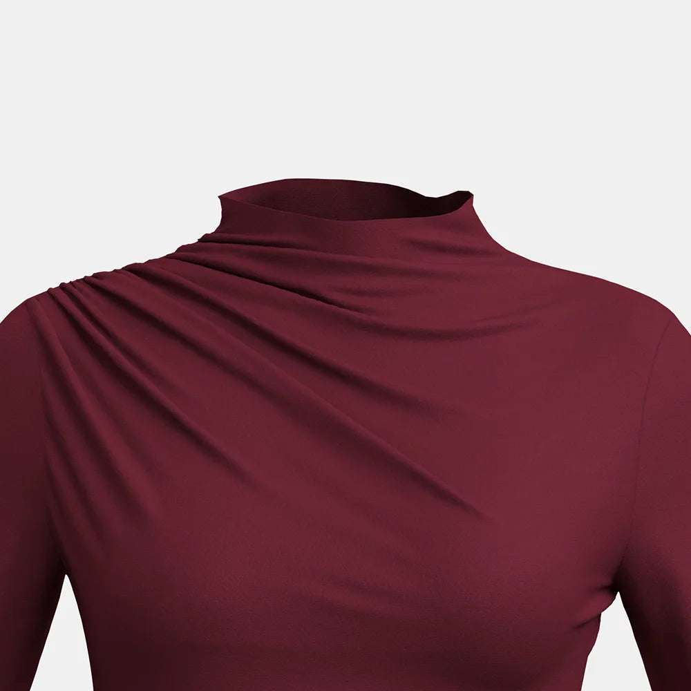 Elevate your autumn wardrobe with our **High-Neck Ruffle Long Sleeve T-Shirt in French Red**. This chic top features a sophisticated high-neck design and delicate ruffle detailing, offering a perfect blend of comfort and style. Crafted from soft,