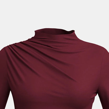 Elevate your autumn wardrobe with our **High-Neck Ruffle Long Sleeve T-Shirt in French Red**. This chic top features a sophisticated high-neck design and delicate ruffle detailing, offering a perfect blend of comfort and style. Crafted from soft,