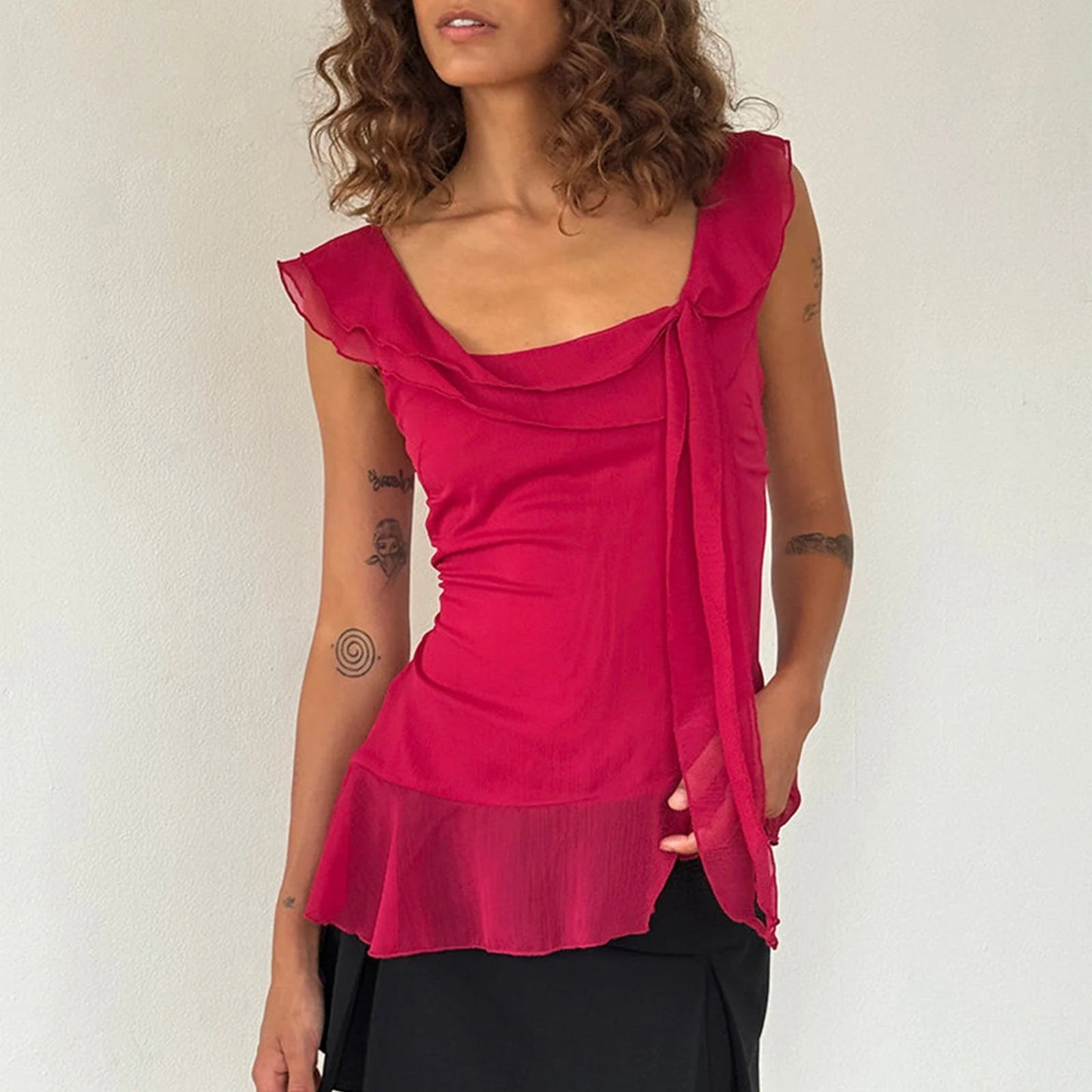 Elevate your summer fashion with the Gaono Y2K Fairy Crop Top! This charming ruffle-trim tank top features a square neck design, crafted from a soft cotton and polyester blend for ultimate comfort. With its lightweight chiffon fabric and slight stretch