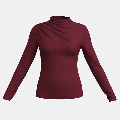 Elevate your autumn wardrobe with our High-Neck Ruffle Long Sleeve T-Shirt in French Red. This chic top features a sophisticated high-neck design and delicate ruffle detailing, combining elegance with comfort. Crafted from soft, breathable fabric, it’s perfect
