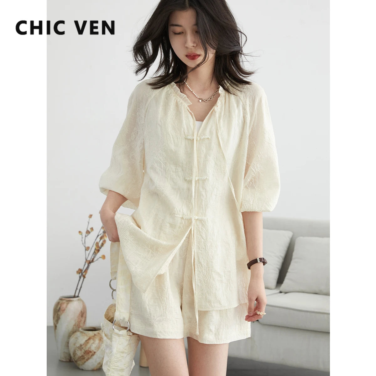 Discover the elegance of our **Embroidered Chinese Blouse & Shorts Set**, a perfect fusion of traditional artistry and modern style. This chic outfit features intricate embroidery, crafted from soft, breathable fabric for all-day comfort. The relaxed fit flatters every