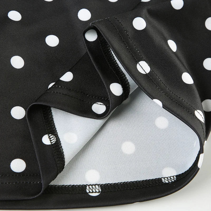 Chic asymmetrical polka dot tank top crafted from lightweight, breathable polyester, perfect for summer streetwear and casual outings. This trendy piece features a unique scarf detail and a flattering fit, making it a versatile addition to your wardrobe. Pair it effortlessly