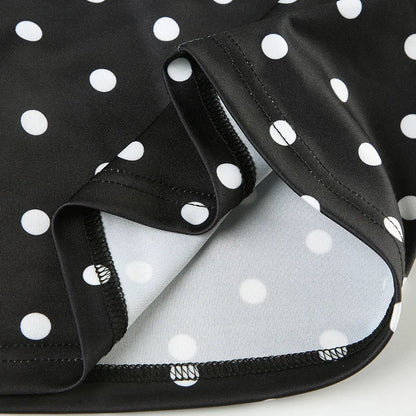 Chic asymmetrical polka dot tank top crafted from lightweight, breathable polyester, perfect for summer streetwear and casual outings. This trendy piece features a unique scarf detail and a flattering fit, making it a versatile addition to your wardrobe. Pair it effortlessly
