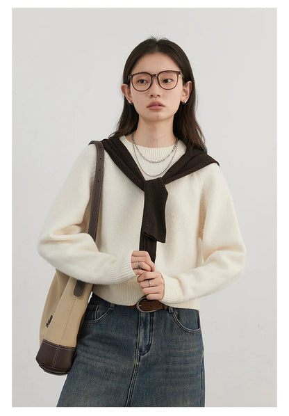 Cozy Loose Knitted Jumper with Raglan Sleeves, designed for ultimate comfort and style. This versatile wardrobe staple features soft, luxurious fabric and a flattering loose fit, perfect for lounging at home or brunch outings. Available in classic colors, it