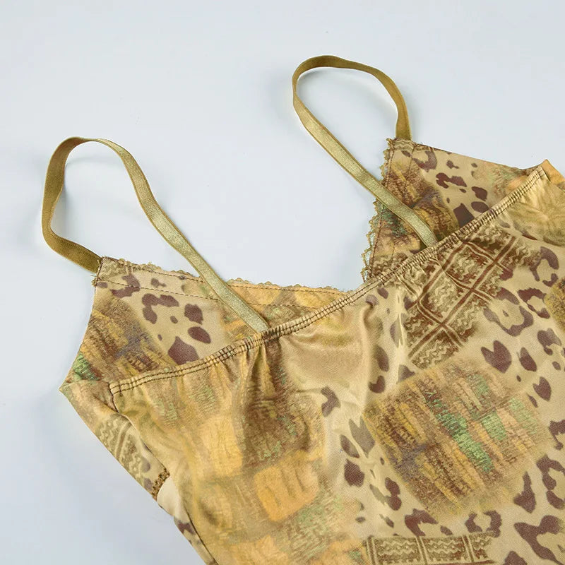 Elevate your summer style with the Gaono Y2K Vintage Women's Sleeveless Cami Top! This chic camisole showcases a captivating abstract print and a stylish ribbon tie-up front, perfect for layering or wearing on its own. Made from lightweight broad