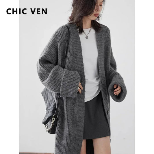 Elevate your wardrobe with the Korean Loose Knitted Cardigan & Long Coat, a stylish and cozy layering essential. Crafted from luxuriously soft knitted fabric, this oversized cardigan offers a relaxed silhouette that flatters every figure. Featuring a timeless design with