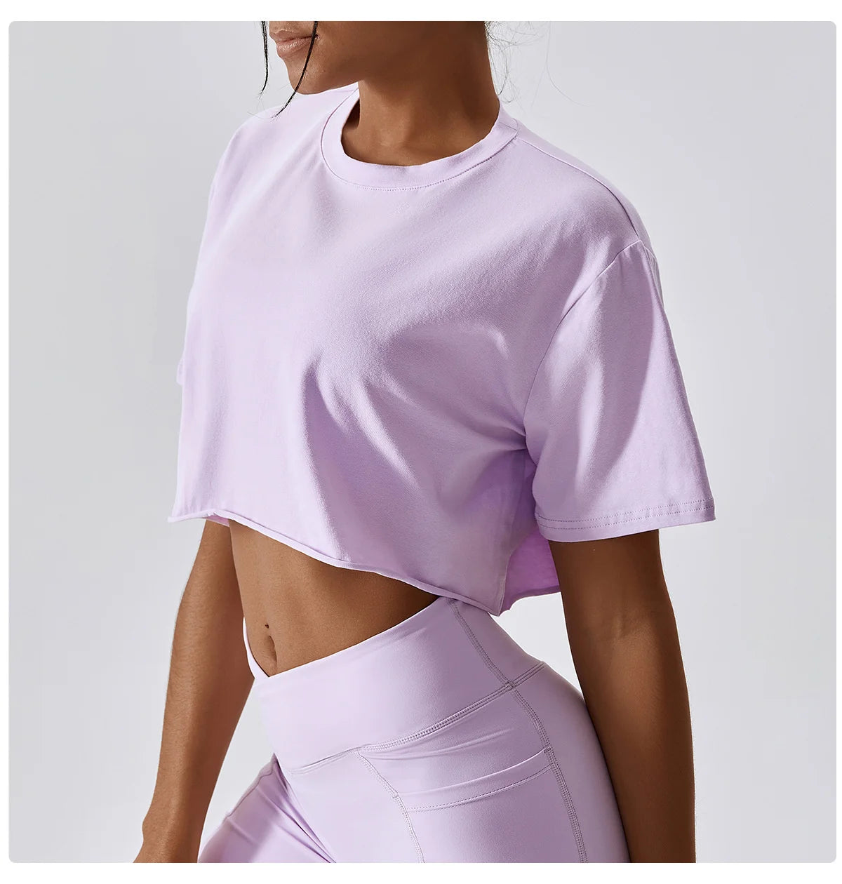 Stylish NCLAGEN Casual T-shirt in a soft lavender hue, designed for ultimate comfort and breathability. This trendy crop top features a loose fit, making it perfect for yoga, dance, or casual outings. Experience freedom of movement while looking chic