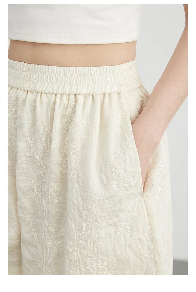 Discover the exquisite **Embroidered Chinese Blouse & Shorts Set**, a perfect blend of traditional artistry and modern style. This elegant outfit features intricate embroidery, crafted from soft, breathable fabric for ultimate comfort. The relaxed fit flatters every silhouette, while