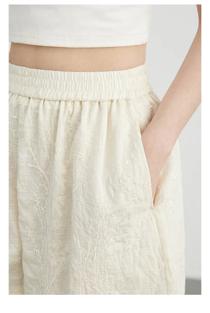 Discover the exquisite **Embroidered Chinese Blouse & Shorts Set**, a perfect blend of traditional artistry and modern style. This elegant outfit features intricate embroidery, crafted from soft, breathable fabric for ultimate comfort. The relaxed fit flatters every silhouette, while