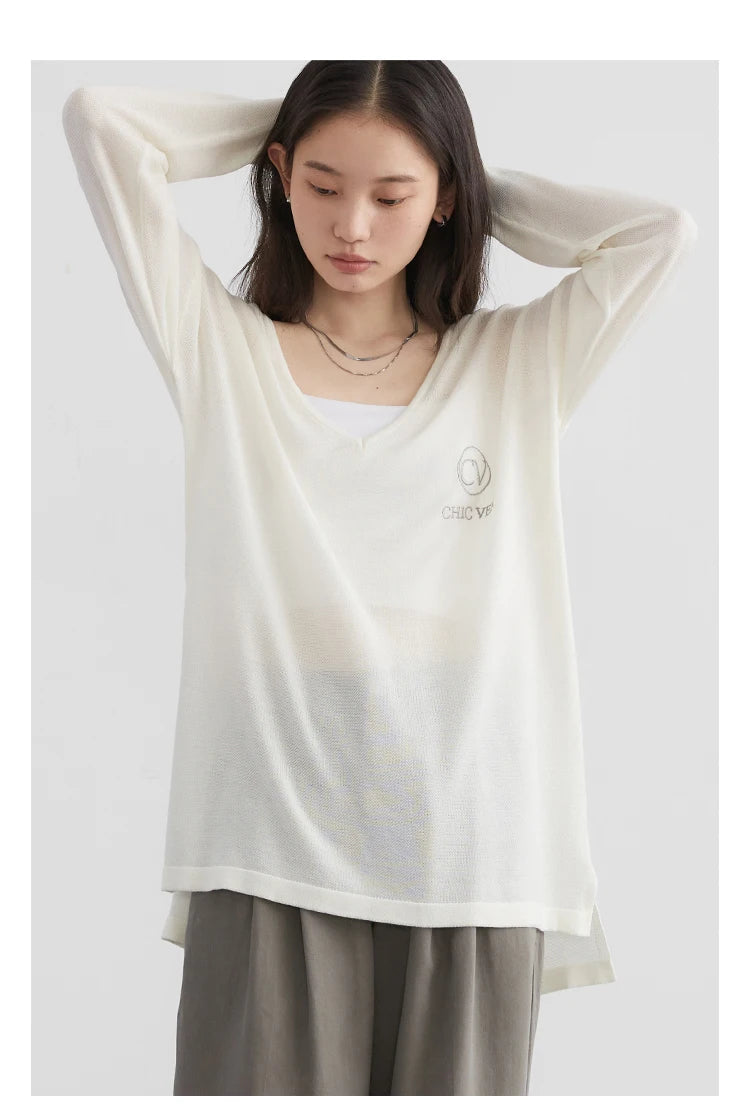 Elevate your wardrobe with our Loose V-Neck Embroidered T-Shirt, designed for the modern woman who values both style and comfort. Crafted from lightweight, breathable fabric, this tee provides natural sun protection while keeping you cool. The elegant embroidered details