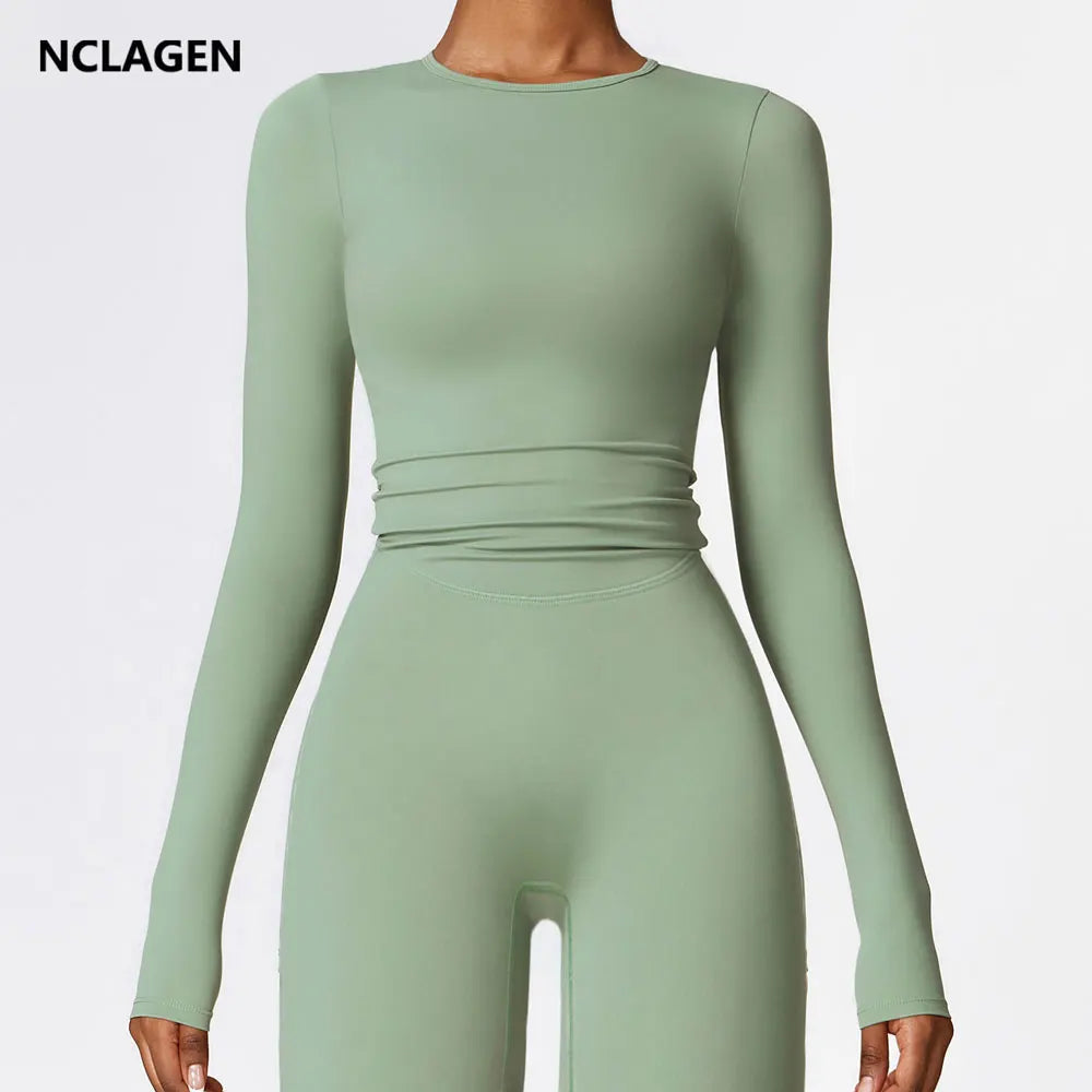 Elevate your activewear collection with the NCLAGEN Yoga Shirt! This stylish long-sleeve top features a breathable nylon and spandex blend, ensuring maximum comfort during yoga, running, or gym sessions. The quick-dry material keeps you feeling