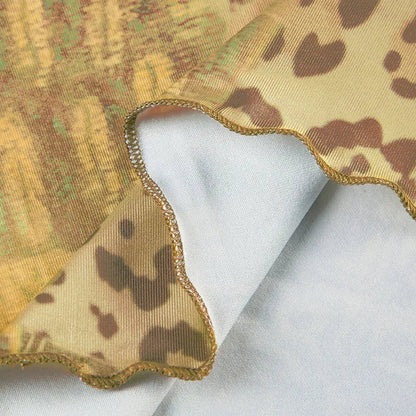 Discover the Gaono Y2K Vintage Women's Sleeveless Cami Top, a must-have addition to your summer wardrobe! This stylish camisole showcases a unique abstract print and a charming ribbon tie-up front, perfect for layering or wearing on its own.