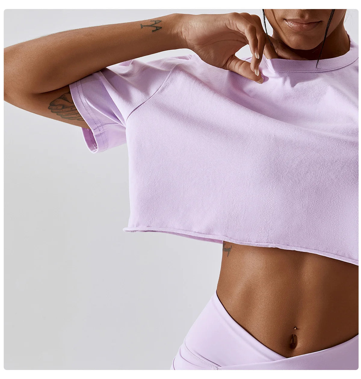 Elevate your fitness fashion with the NCLAGEN Casual T-shirt! This stylish crop top, crafted from soft and breathable cotton and spandex, ensures maximum comfort and a loose fit for unrestricted movement. Perfect for yoga, dance, or running, it