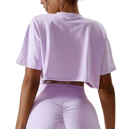 Stylish NCLAGEN Casual T-shirt in a chic lavender hue, designed for ultimate comfort and functionality. Crafted from soft, breathable cotton and spandex, this crop top offers a loose fit for unrestricted movement. Perfect for yoga, dance, or casual