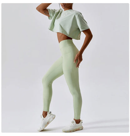 Stylish NCLAGEN Casual T-shirt in a chic crop design, perfect for yoga, dance, or running. Made from soft, breathable cotton and spandex, this loose-fit top offers ultimate comfort and freedom of movement. Ideal for both gym sessions