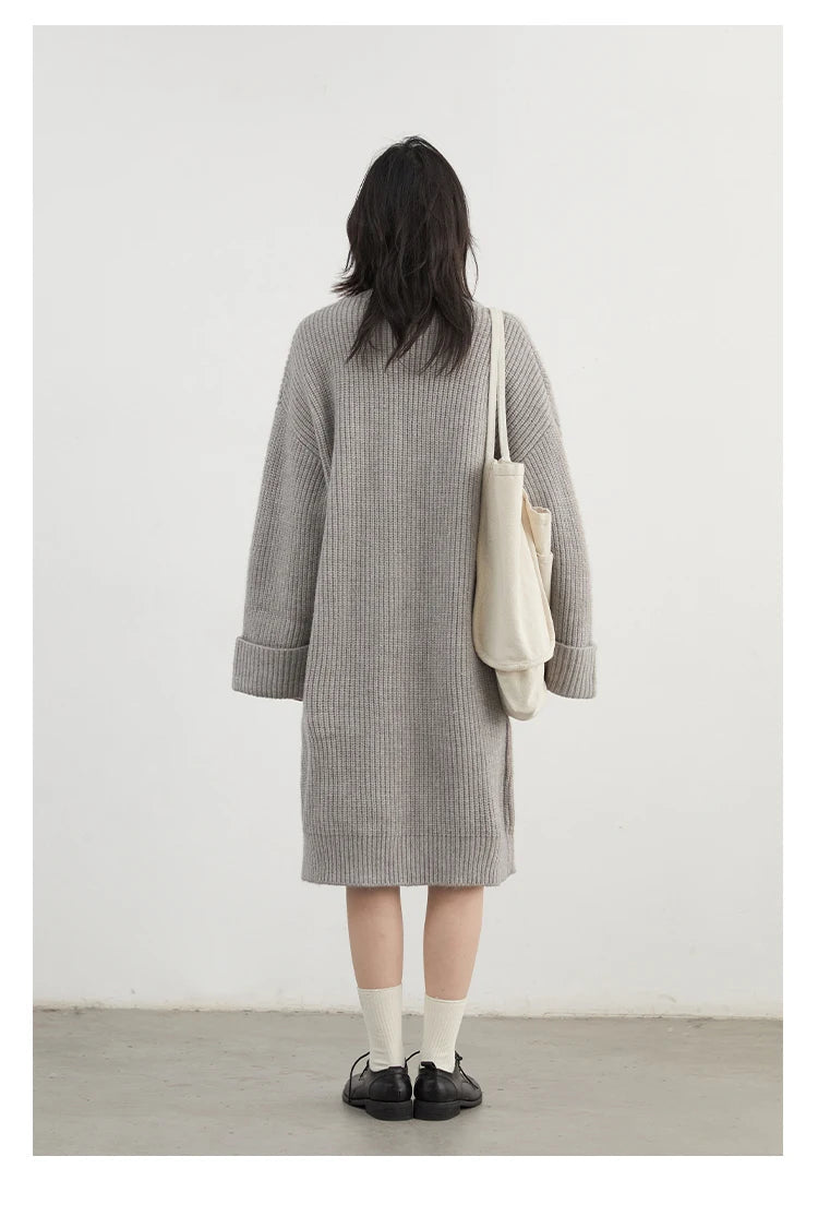 Effortlessly stylish Korean Loose Knitted Cardigan & Long Coat, featuring a luxuriously soft knitted fabric for ultimate comfort. This oversized piece offers a relaxed silhouette, perfect for layering. With a timeless design and button closure, it’s versatile enough