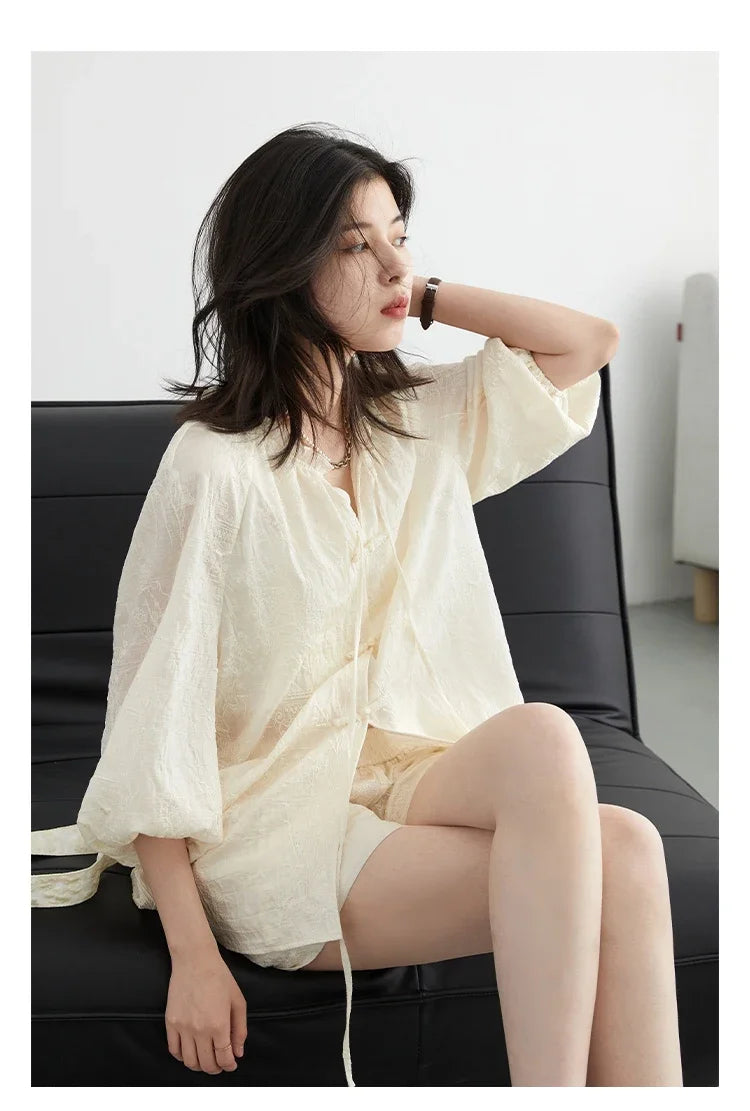 Discover the elegance of our **Embroidered Chinese Blouse & Shorts Set**, a perfect blend of traditional artistry and modern style. This chic outfit features intricate embroidery on soft, breathable fabric, ensuring comfort on warm days. With its relaxed fit and coordinated