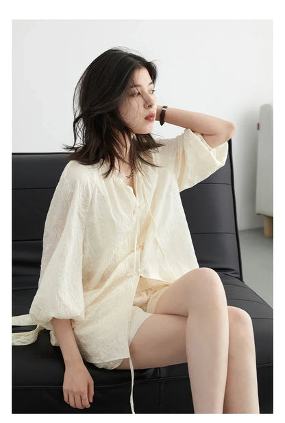 Discover the elegance of our **Embroidered Chinese Blouse & Shorts Set**, a perfect blend of traditional artistry and modern style. This chic outfit features intricate embroidery on soft, breathable fabric, ensuring comfort on warm days. With its relaxed fit and coordinated