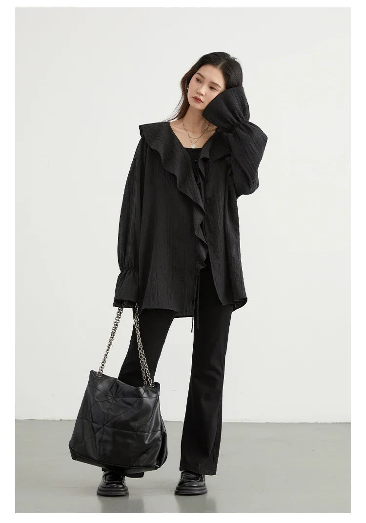 Chic Ruffled V-Neck Lace-Up Blouse, perfect for spring and summer. This stylish top features a beautiful ruffled neckline and playful lace-up detailing for an adjustable fit. Designed with a loose fit for ultimate comfort and breathability, it