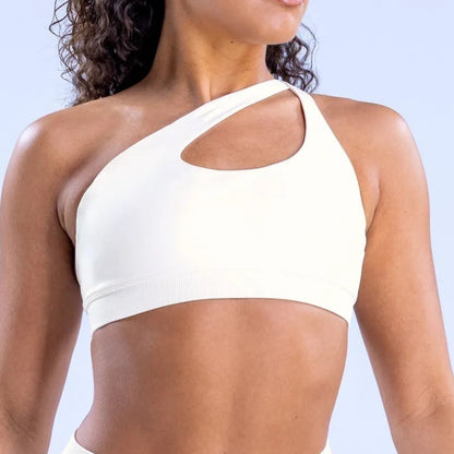 Elevate your activewear collection with the NCLAGEN Impact Asymmetric Sports Bra. This stylish halter design offers high support for yoga and high-intensity workouts, ensuring you stay comfortable and confident. Crafted from quick-dry, breathable nylon fabric,