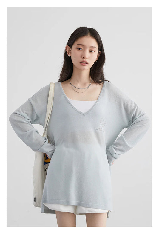 Embrace effortless style with our Loose V-Neck Embroidered T-Shirt, perfect for Spring/Summer 2024. This chic tee features lightweight, breathable fabric that offers comfort and natural sun protection. The beautifully embroidered details add an elegant touch,