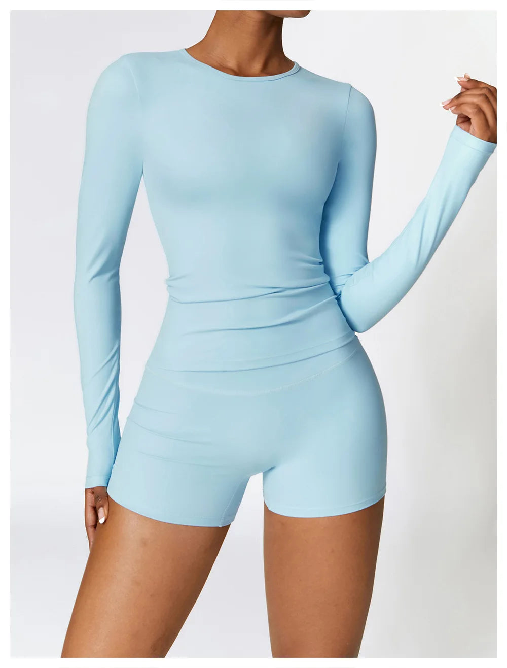 Elevate your activewear collection with the NCLAGEN Yoga Shirt! This stylish long-sleeve top features a quick-dry, breathable nylon and spandex blend for ultimate comfort during workouts. Designed with a flattering slim fit, it enhances your silhouette