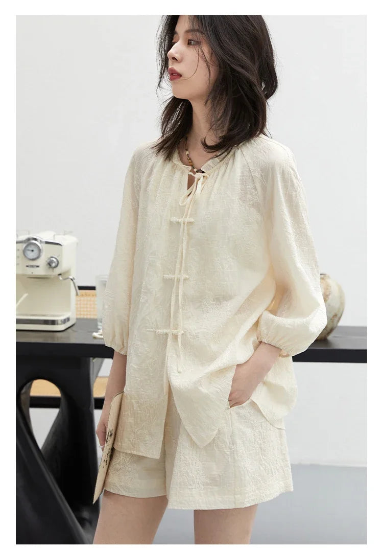 Discover the Embroidered Chinese Blouse & Shorts Set, a perfect blend of traditional craftsmanship and modern elegance. This stunning outfit features intricate embroidery, soft breathable fabric, and a relaxed fit for ultimate comfort. Ideal for warm days, the coordinated shorts complete