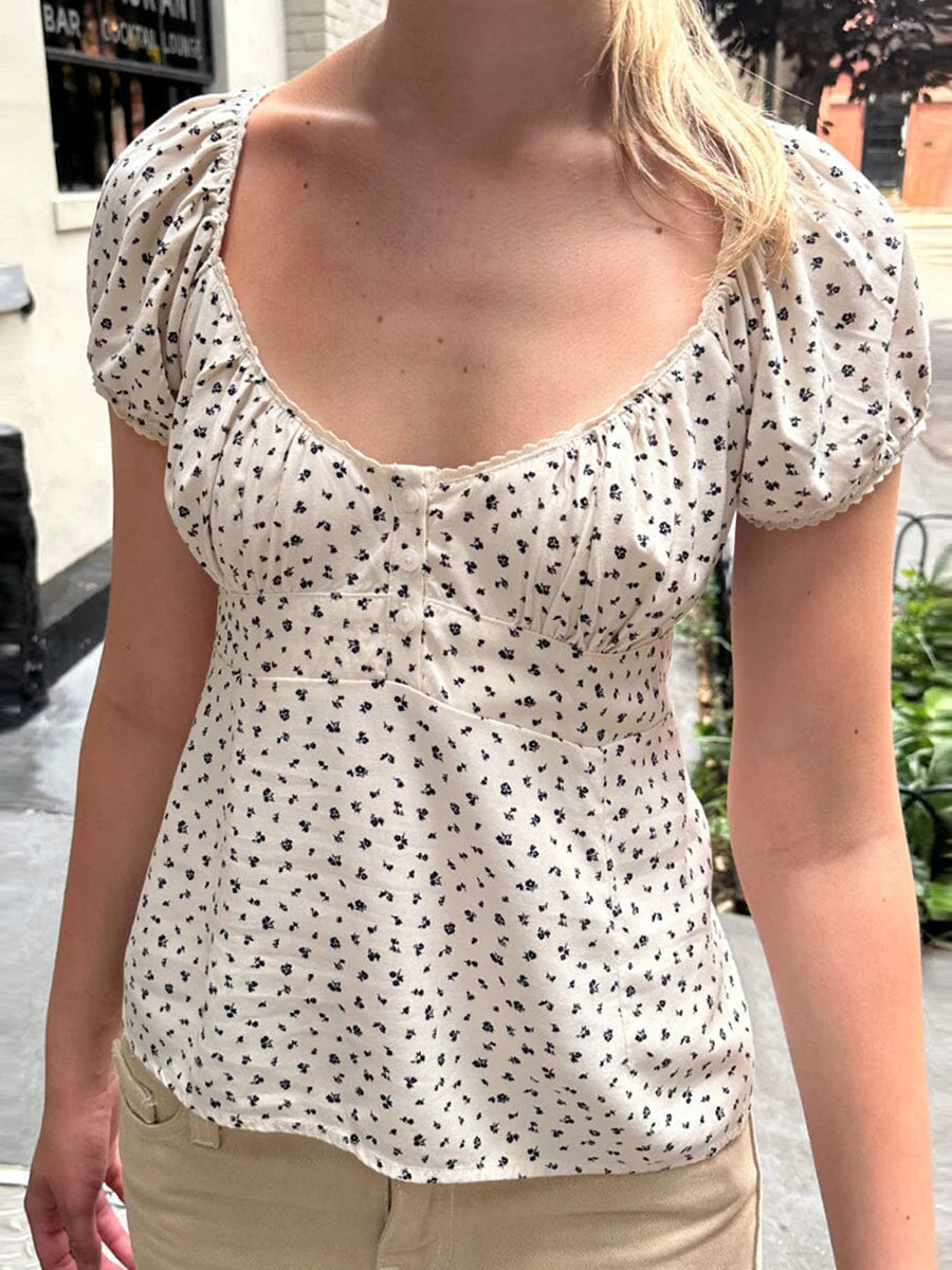 Discover the enchanting Gaono Y2K Fairy Cottage Vintage T-shirt, designed to bring a touch of retro grunge charm to your wardrobe. Featuring a cute square collar and whimsical lace details, this top is perfect for summer outings. Made from a soft