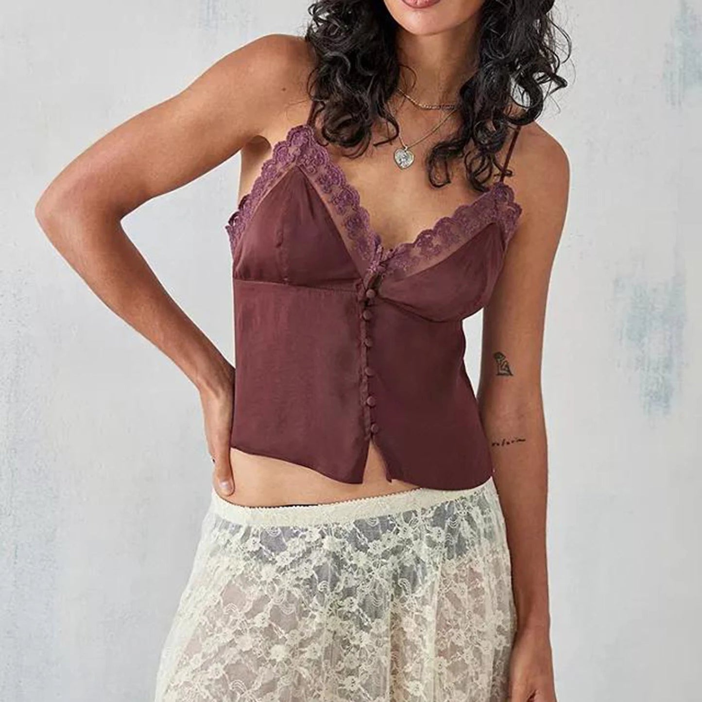 Stylish Gaono Women Sleeveless Camisole Tank Top featuring an elegant ruffle V-neck and delicate lace trim. Made from a soft cotton and spandex blend, this comfortable piece is perfect for summer outings and casual gatherings. Versatile solid color