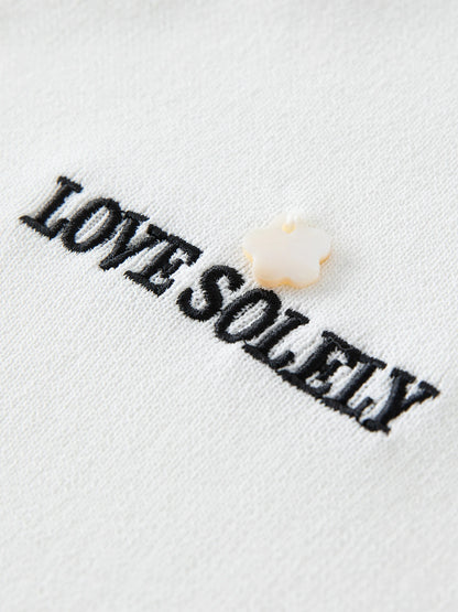 Curve-Flattering Knit Top & Structured Collar