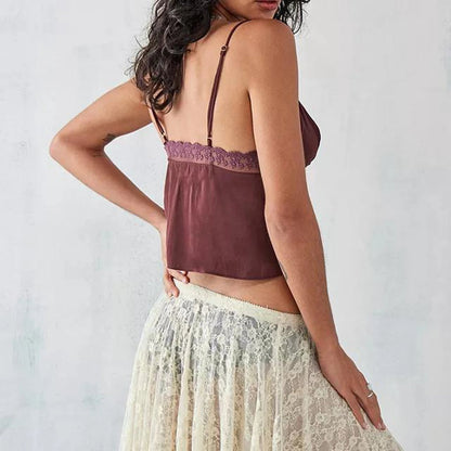 Elevate your summer style with the Gaono Women Sleeveless Camisole Tank Top! This chic tank features a flattering ruffle V-neck and delicate lace trim, crafted from a soft cotton and spandex blend for ultimate comfort. Perfect for both street