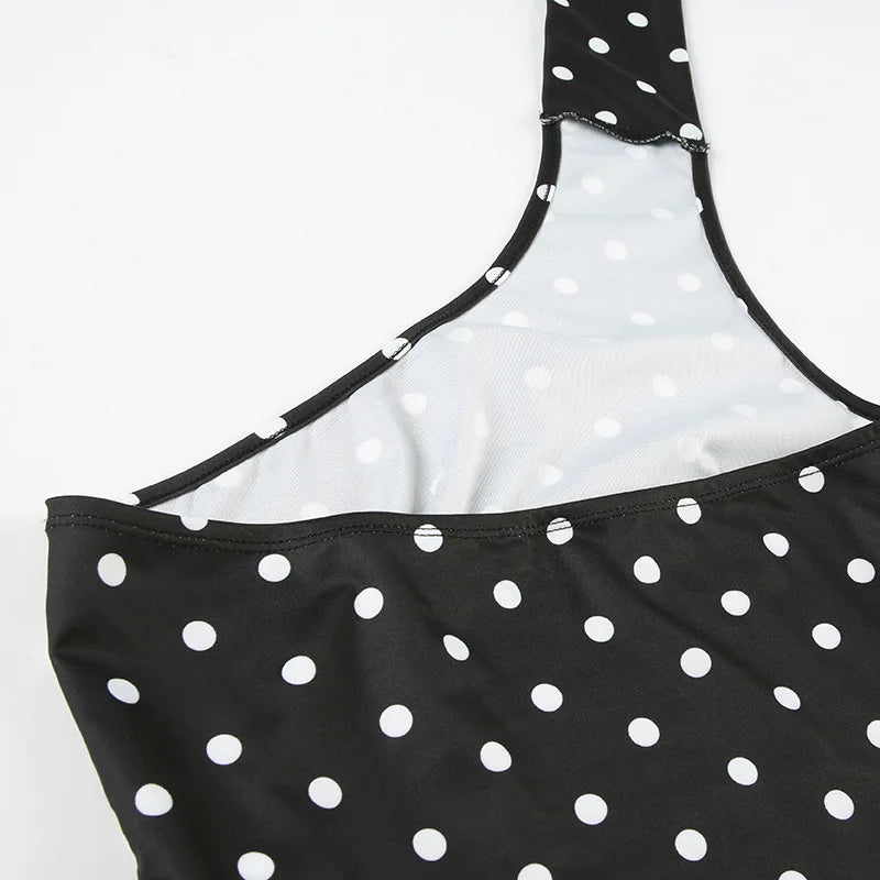 Discover the Gaono Asymmetrical Polka Dot Tank Top, a must-have for your summer wardrobe! This stylish tank features a unique asymmetrical design and chic scarf detail, crafted from lightweight, breathable polyester for all-day comfort. Perfect for casual outings