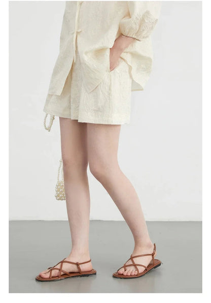 Discover the exquisite Embroidered Chinese Blouse & Shorts Set, a perfect blend of traditional craftsmanship and modern style. Featuring intricate embroidery and made from soft, breathable fabric, this outfit ensures ultimate comfort on warm days. The relaxed fit flatters every silhouette