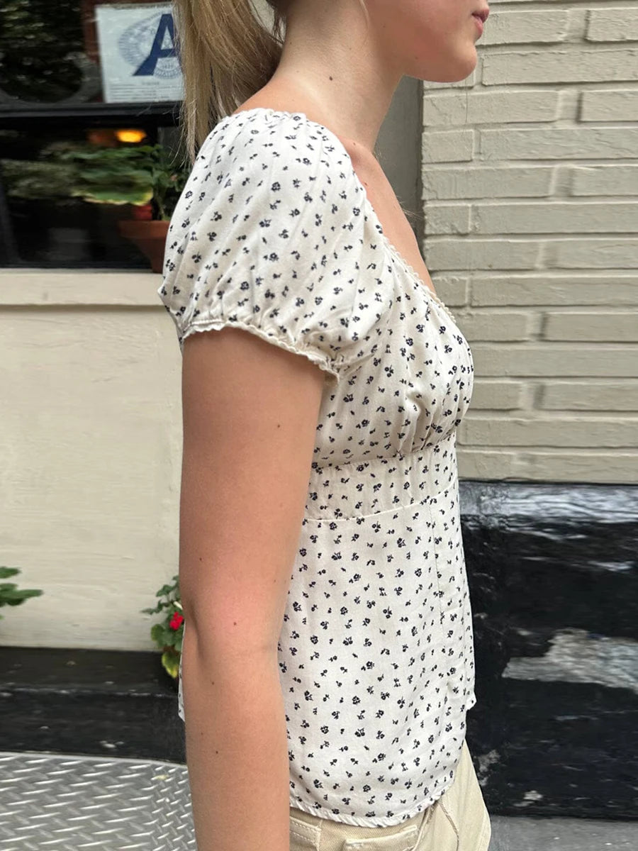 Charming Y2K Fairy Cottage Vintage T-shirt, designed with a cute square collar and whimsical lace details. Made from a soft polyester and spandex blend, this enchanting tee ensures all-day comfort with a flattering fit. Perfect for summer outings, it