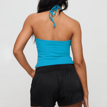 Chic solid hanging neck camisole in vibrant blue, crafted from a soft cotton-spandex blend for ultimate comfort. This backless, slim-fit tank top is perfect for summer streetwear and Y2K aesthetics. Lightweight and breathable, it pairs effortlessly