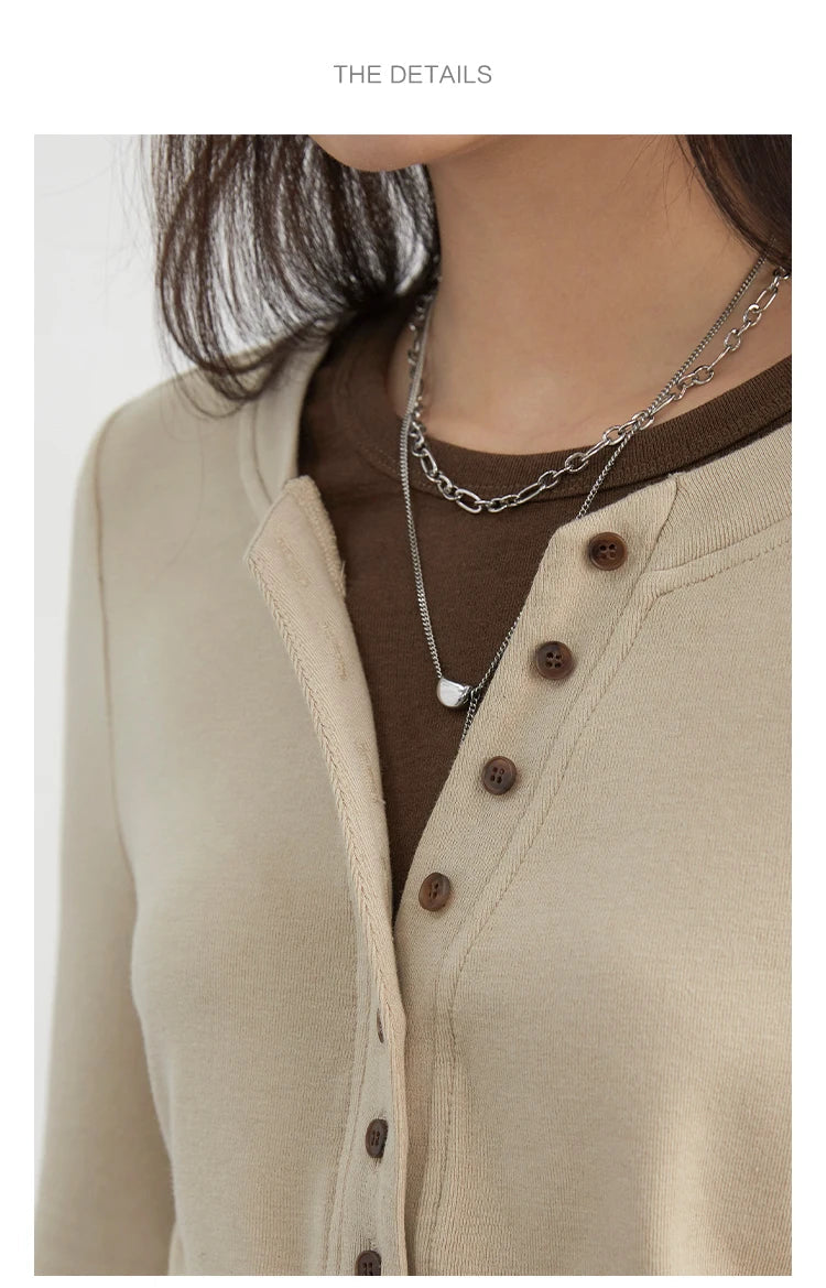 Cozy loose-fit knitted sweater with chic long sleeves, crafted from soft, breathable fabric for all-day comfort. Perfect for layering and available in multiple colors, this versatile top adds effortless elegance to any outfit, making it ideal for casual or dressy occasions